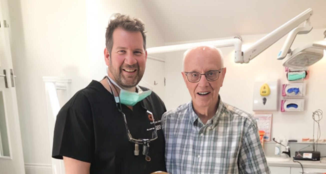 Dr Paul Averley receives hand carved gift from patient