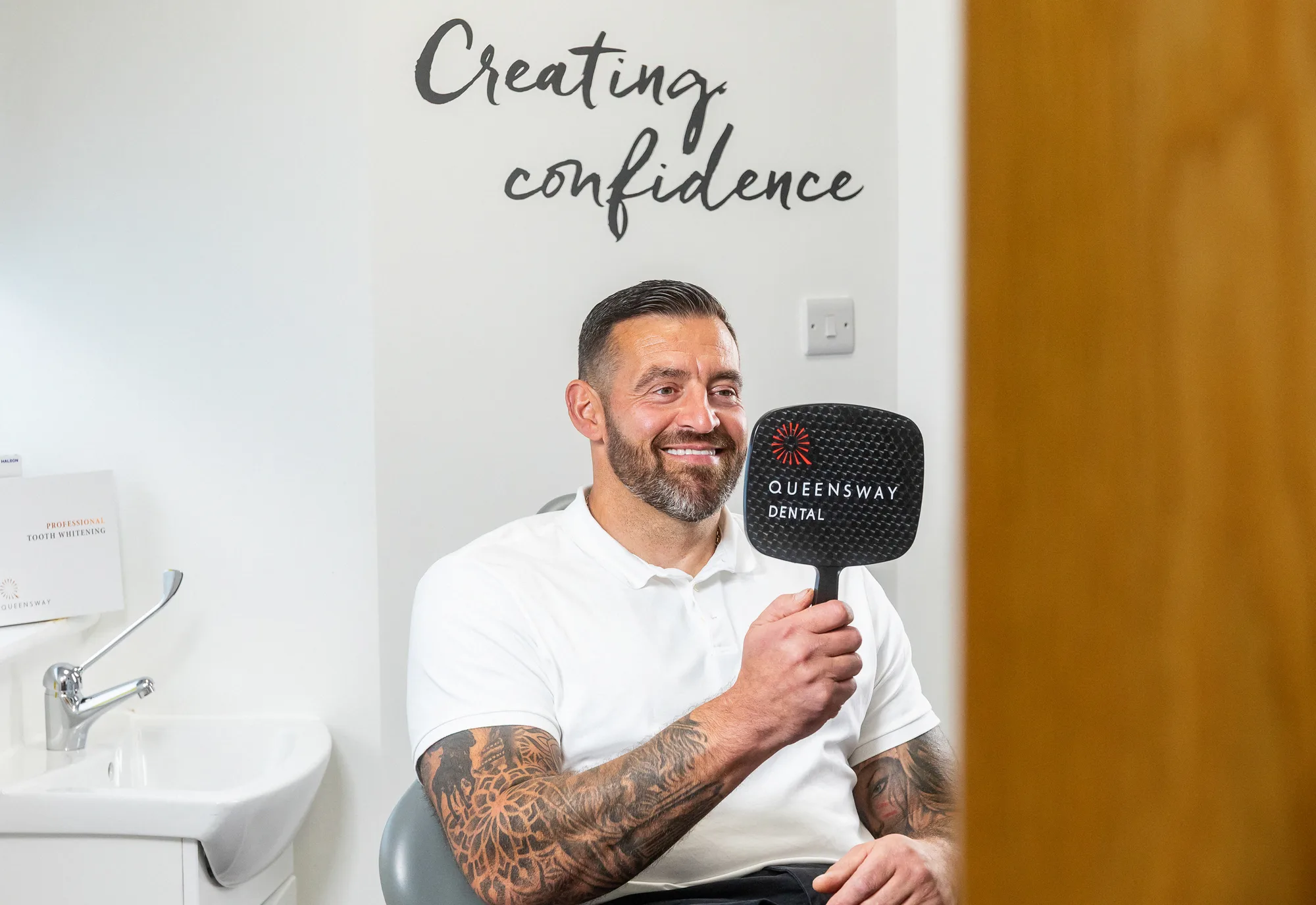 Patient smiling confidently after having a dental bridge fitted Patient smiling confidently after having a dental bridge fitted