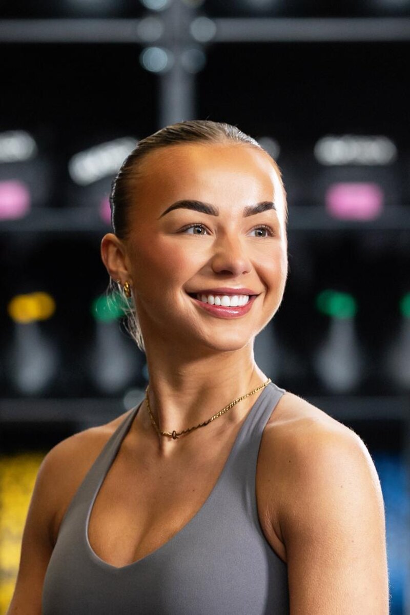 A Queensway Dental patient smiling after veneers