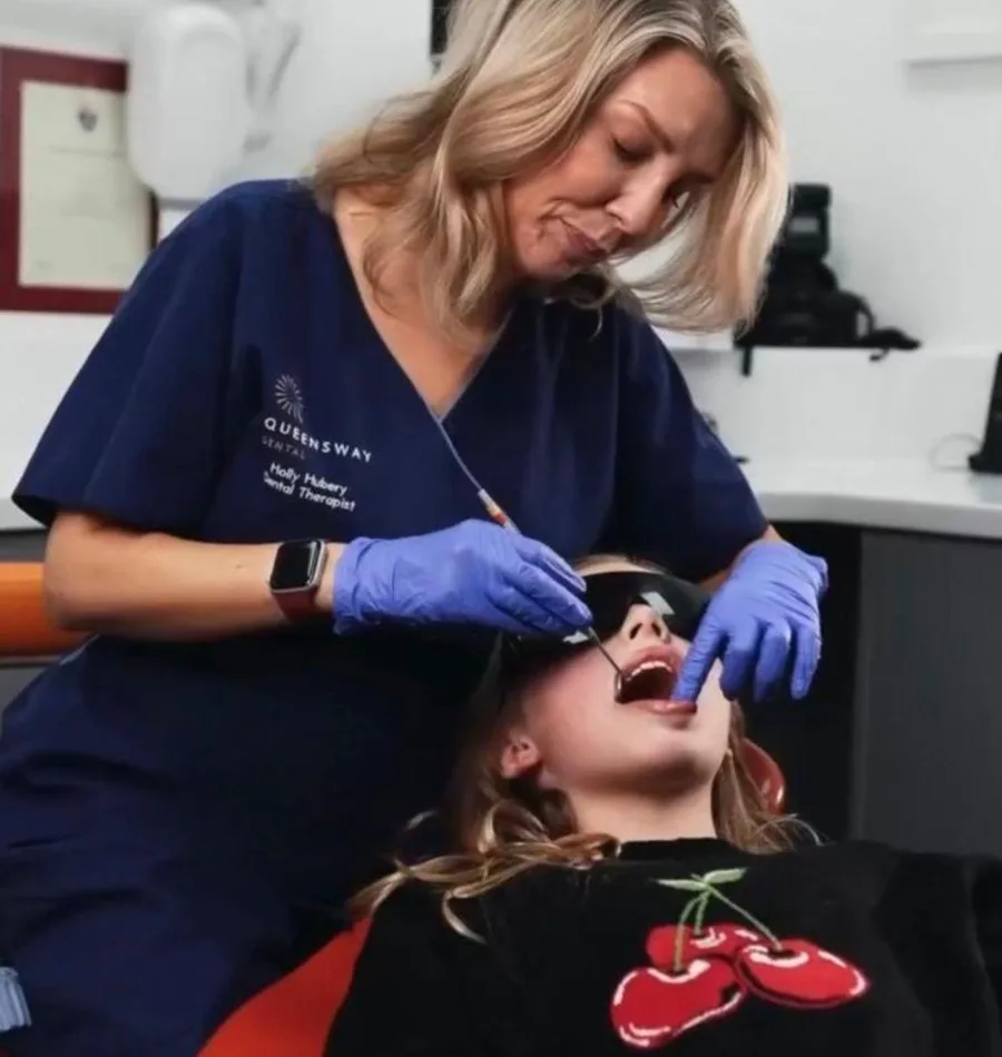A young patient at a friendly dental check-up at Queensway Dental A young patient at a friendly dental check-up at Queensway Dental