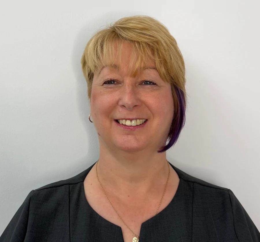 Edwina Train, Receptionist